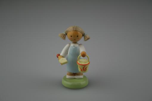 Flade Mädchen mit Sandspielzeug 
