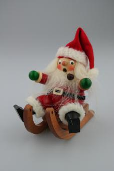 Räuchermann Weihnachtsmann auf Schlitten 