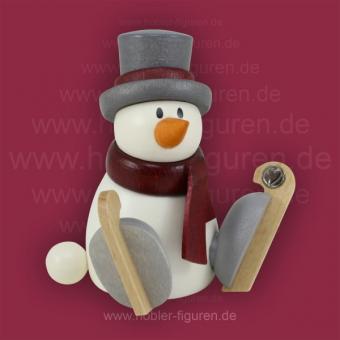 Hobler Schneemann Otto sitzend mit Schlittschuh 